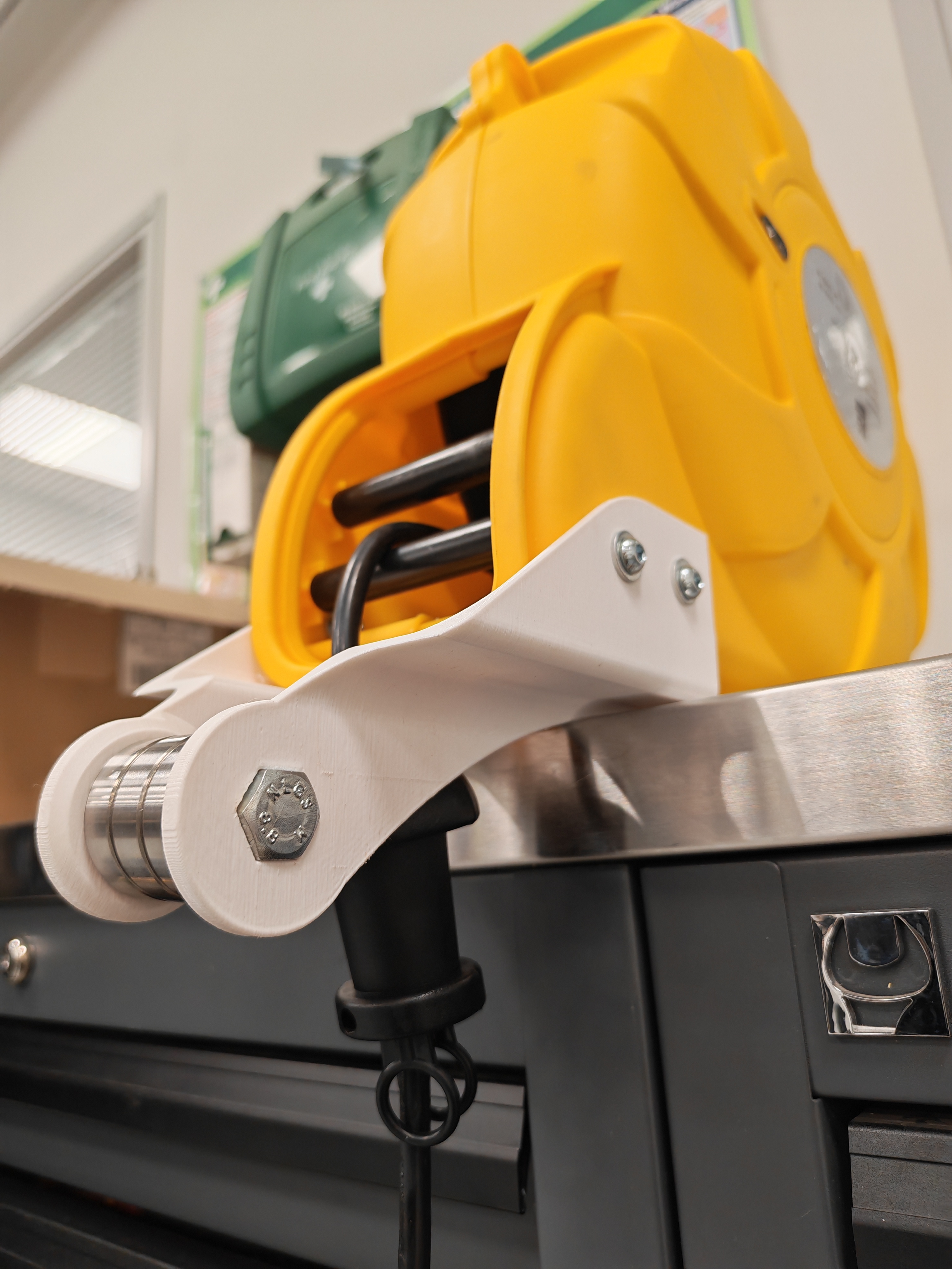 Cable reel bracket installed showing cable routing